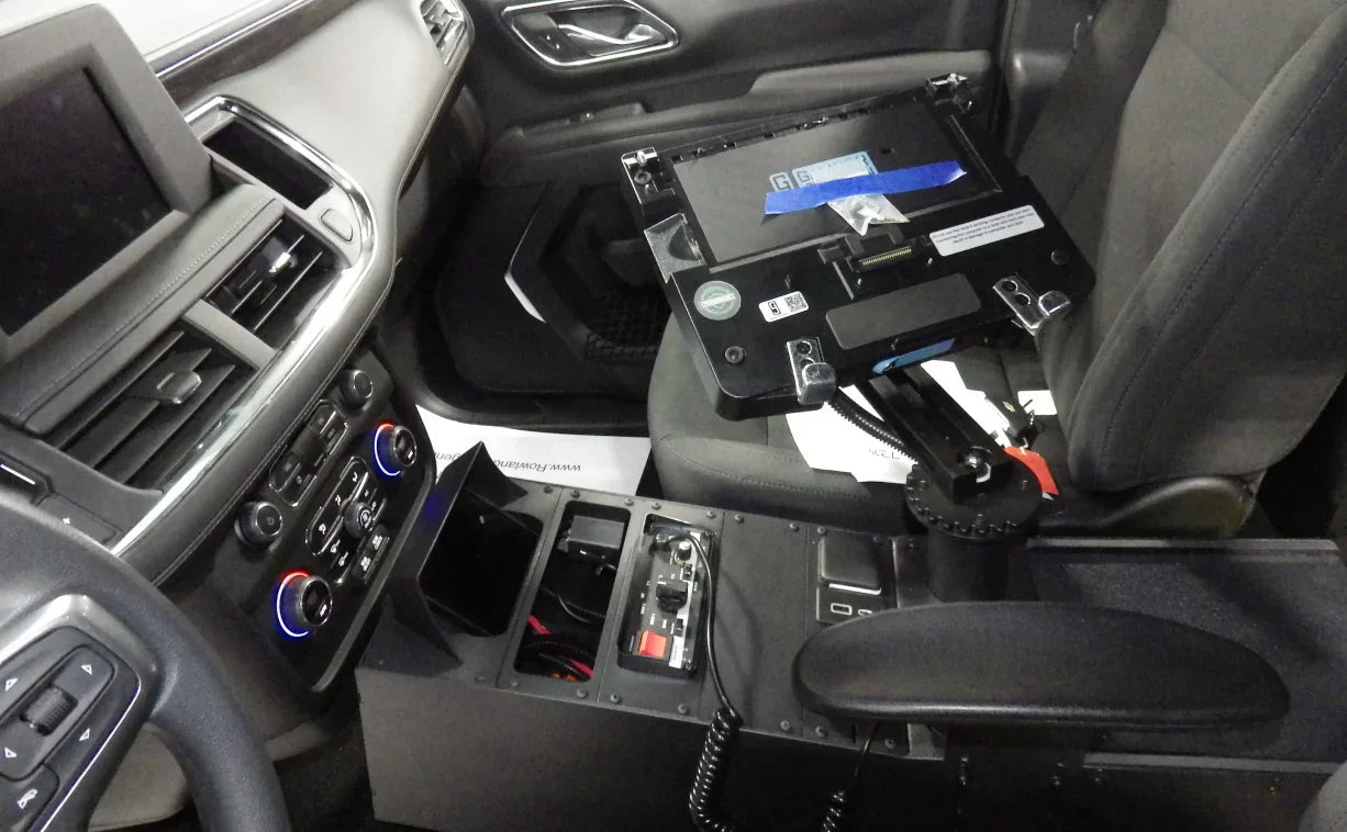 Image of a 14-inch center console with a computer arm, designed for an emergency vehicle.