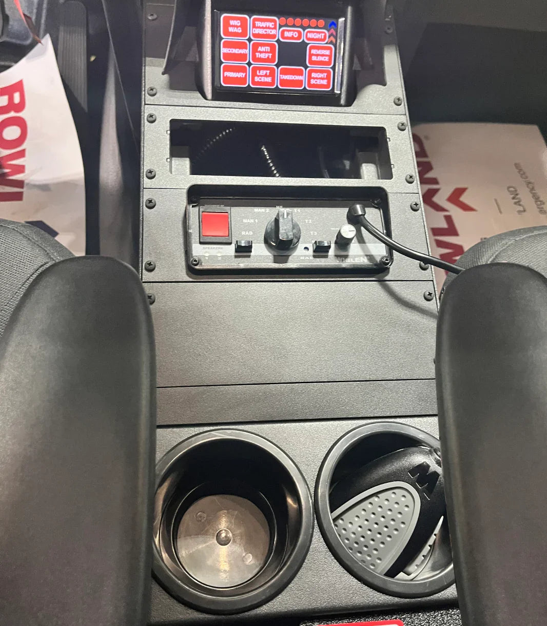 14-inch center console without a computer mount, featuring a dual armrest, designed for a Ford Explorer emergency vehicle.
