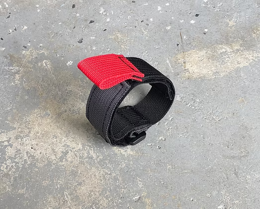 XDcuff Cuff Securement Strap on a Concrete Floor