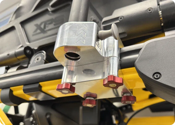 Underside view of Rowland Emergency's Critical Care Removable Block mounted on a Stryker Power-PRO XT stretcher, showcasing its attachment mechanism.