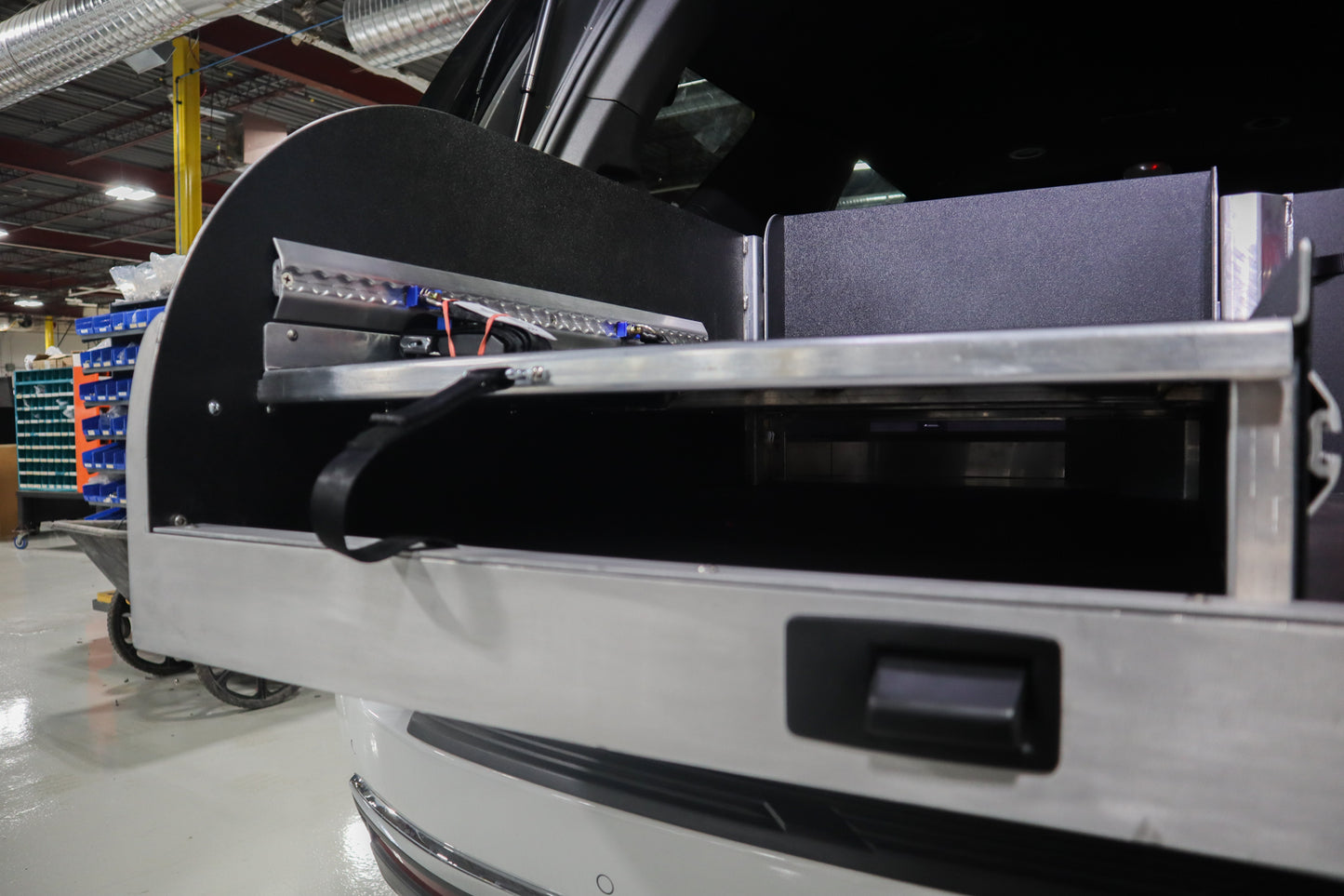 Equipment shelf installed in a Chevrolet Tahoe emergency response vehicle.