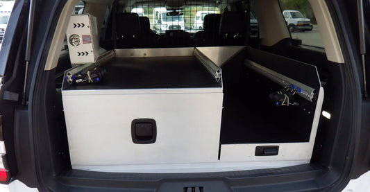 Rear storage L drawer and large drawer for a Ford Expedition Max emergency vehicle, designed for organized and secure equipment storage.