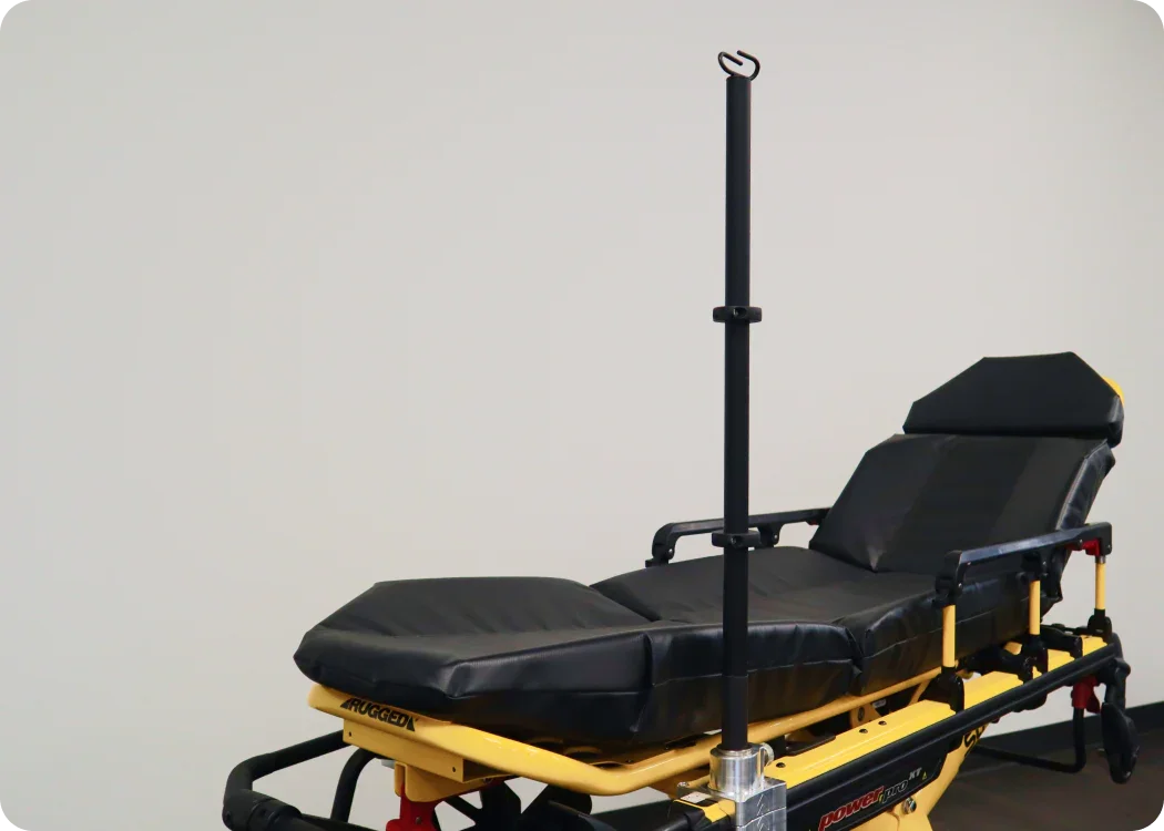 Equipment pole, straight with fixed IV pole by Rowland Emergency, mounted on a Power-PRO XT stretcher for secure medical equipment support.