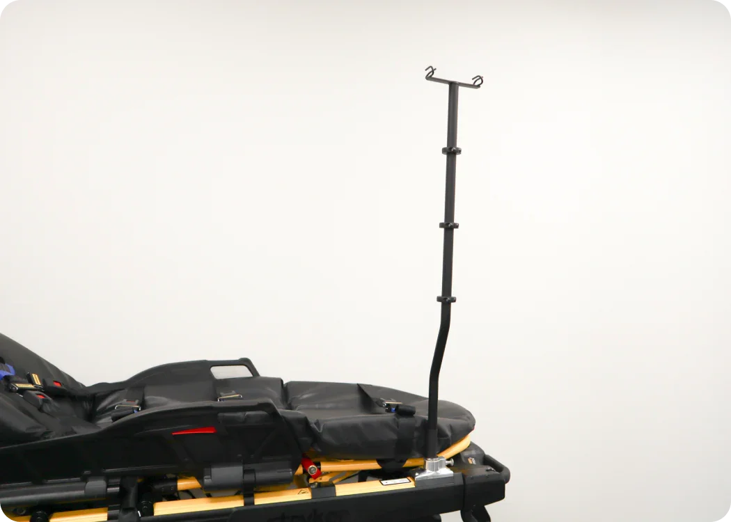 Critical Care Equipment Pole with offset and double IV hook mounted on a Power-PRO 2 stretcher, side view.