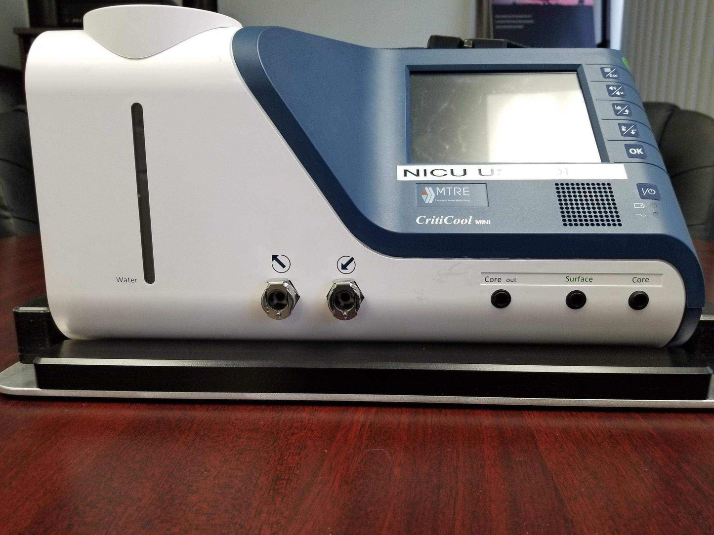 Custom mount for Criti-Cool unit in vehicle by Rowland Emergency, ensuring secure attachment and easy access during patient transport.