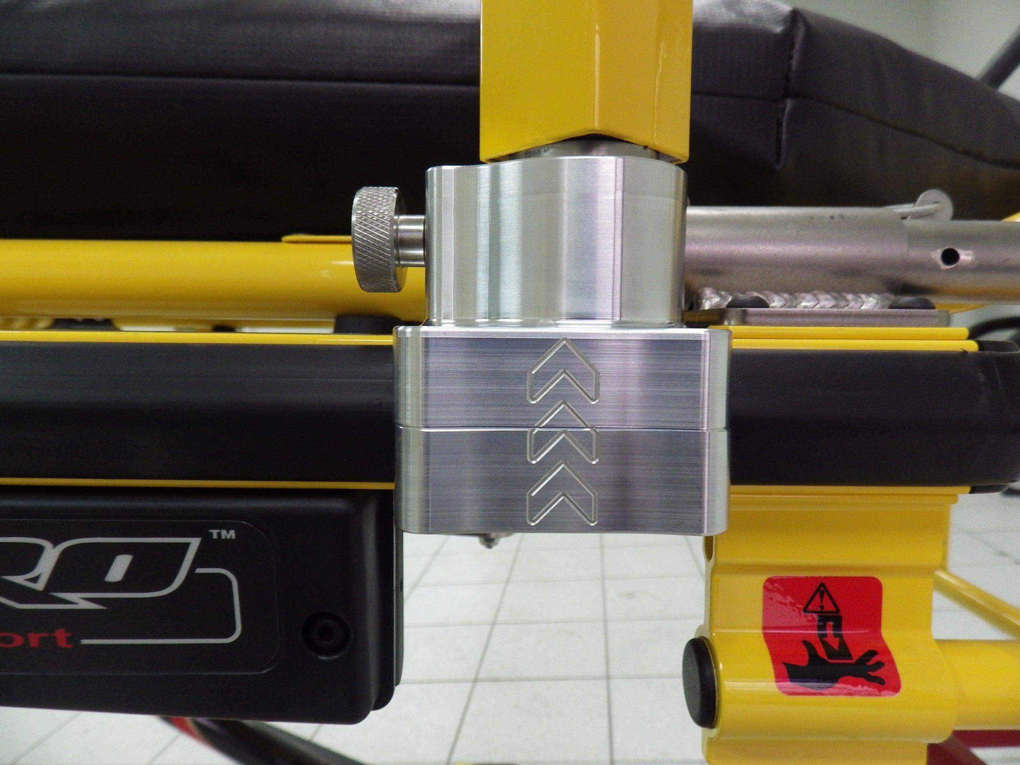 Defibrillator mounting block for Stryker® Bariatric/MX-PRO R3 by Rowland Emergency, providing secure attachment and easy access to defibrillators during patient transport.
