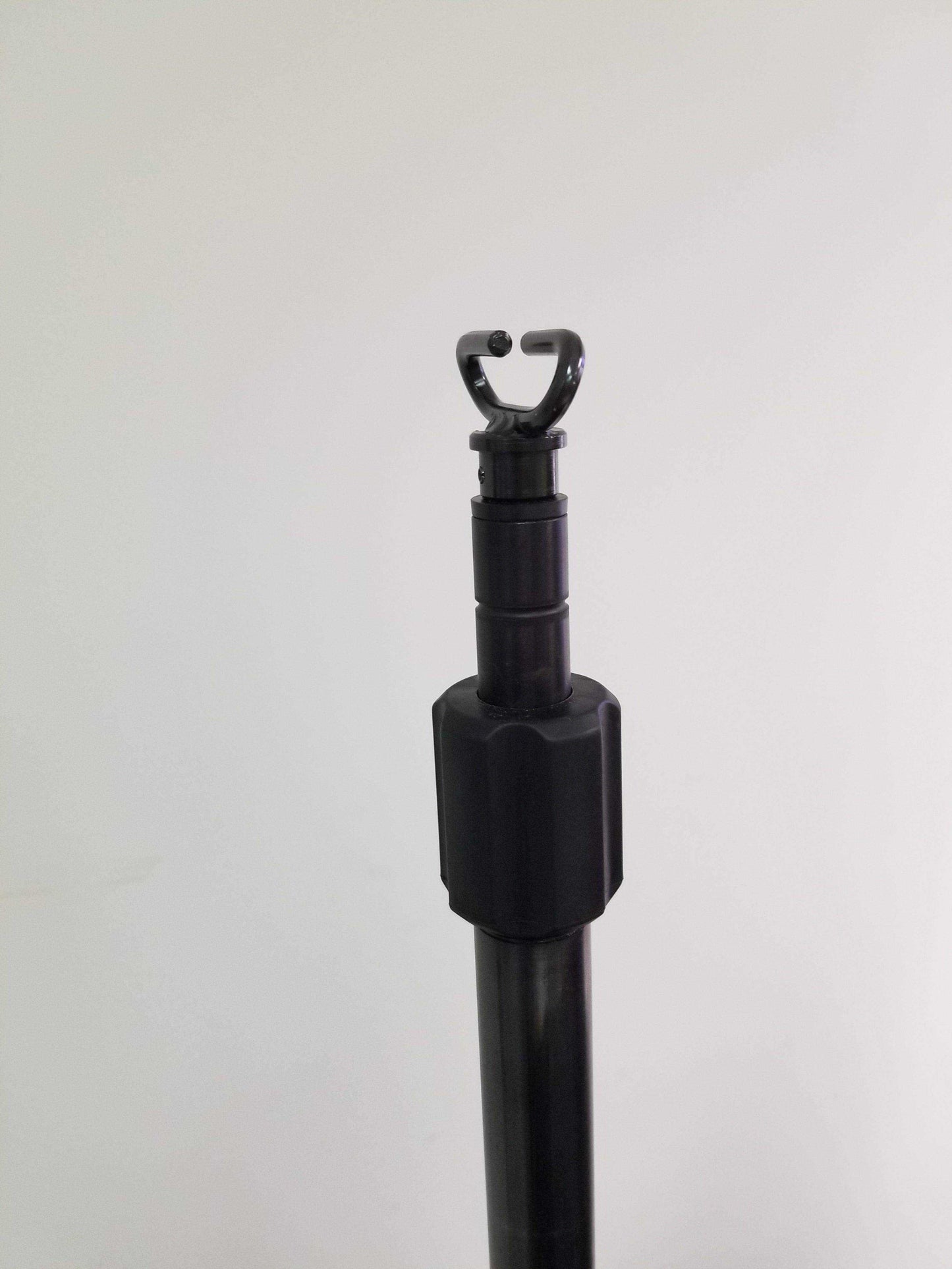 Straight equipment pole by Rowland emergency, includes an IV receptacle.