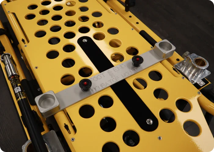 Incubator Kit with foot-end post cups mounted on a Stryker Power-PRO XT stretcher, designed for compatibility with Ferno #9 stretchers and neonatal incubators.