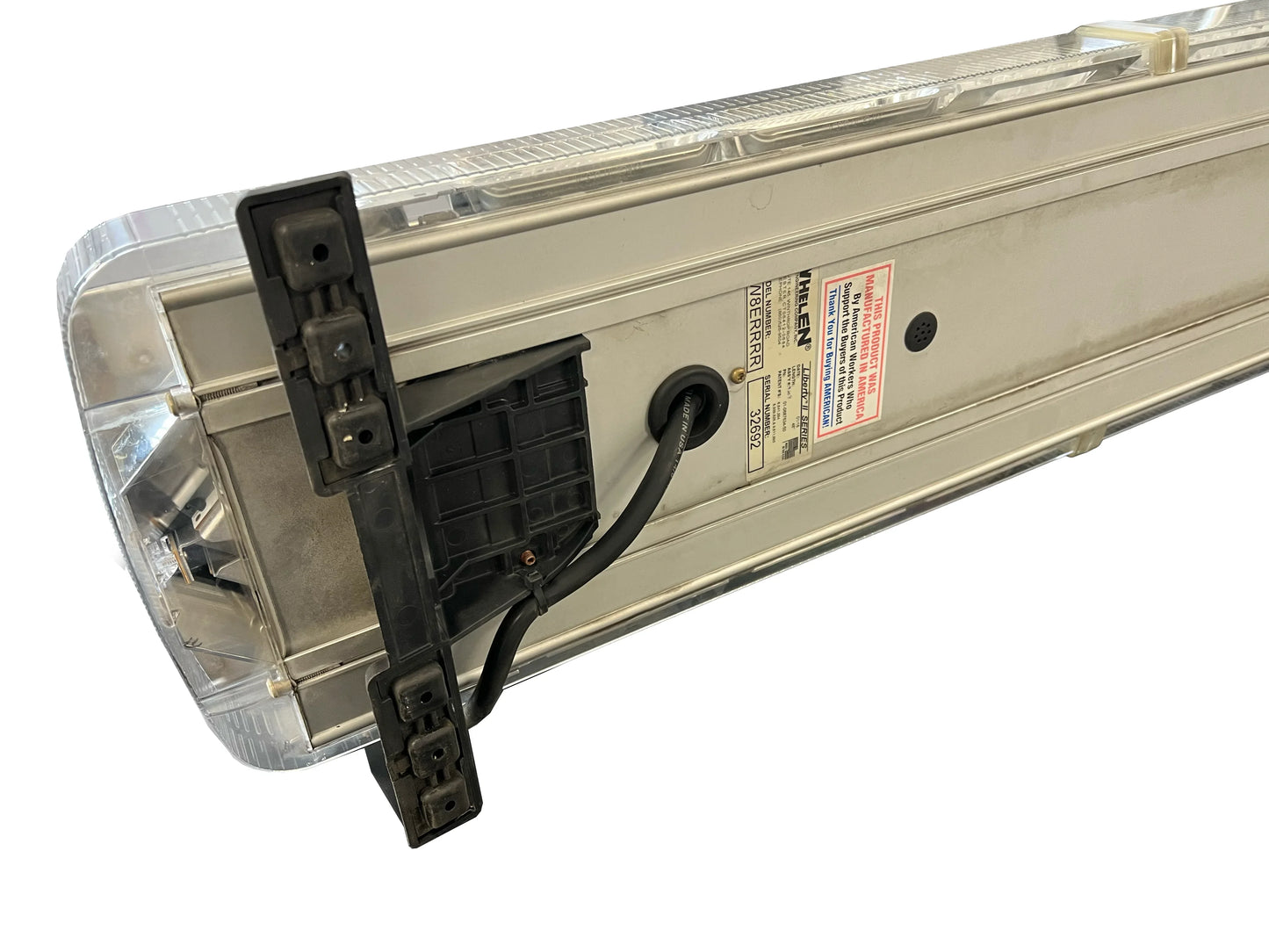 Bottom view of a Whelen emergency vehicle light bar with wiring, distributed by Rowland Emergency