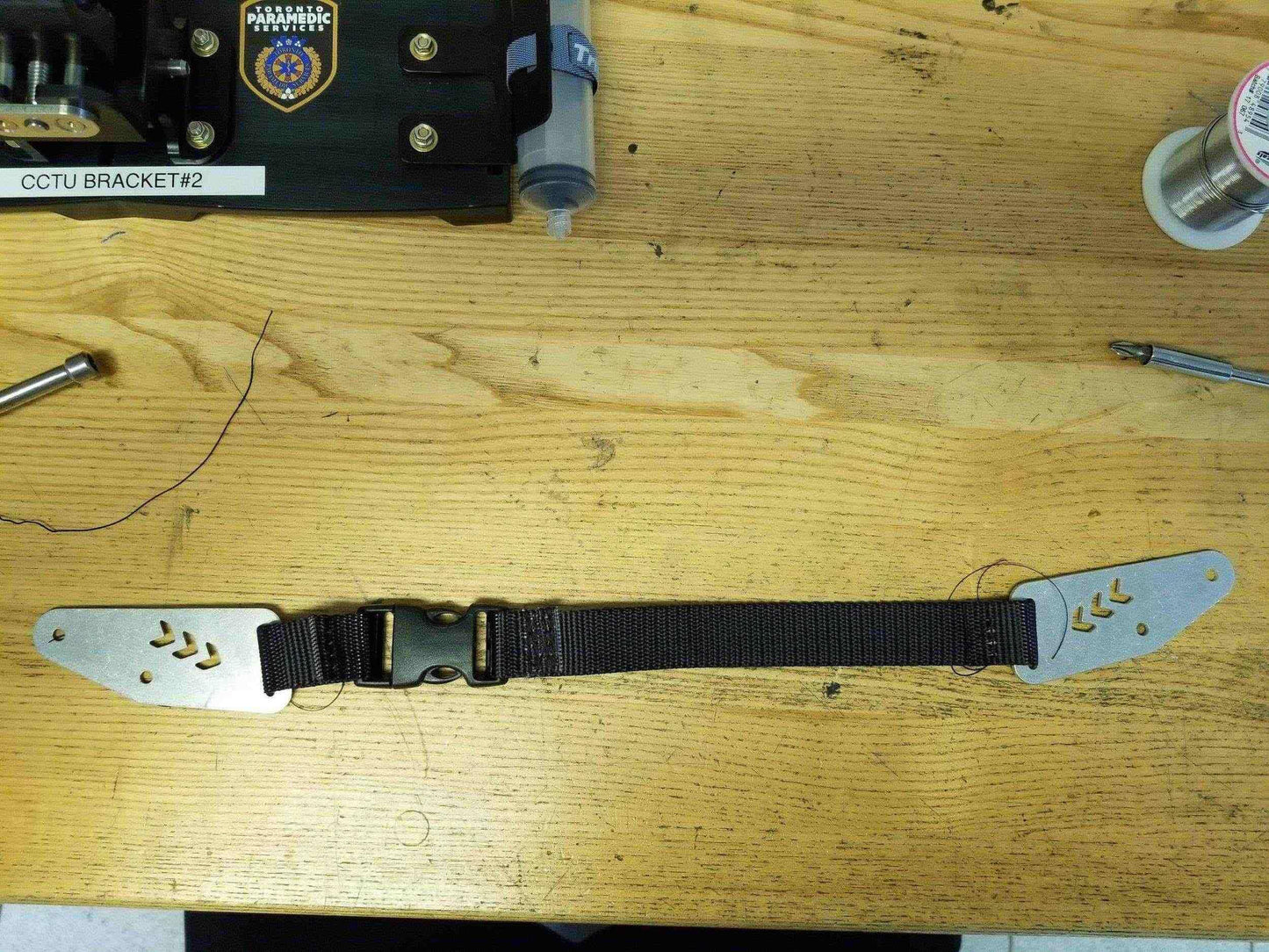 Mount strap for BodyGuard IV pump by Rowland Emergency, providing secure attachment and easy access during patient transport.