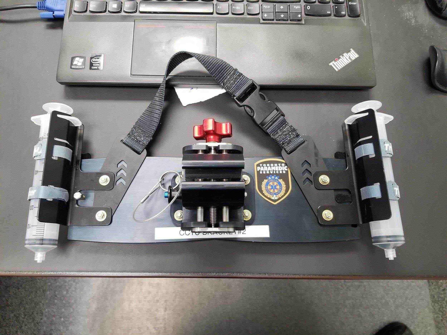 Mount strap for BodyGuard IV pump by Rowland Emergency, providing secure attachment and easy access during patient transport.