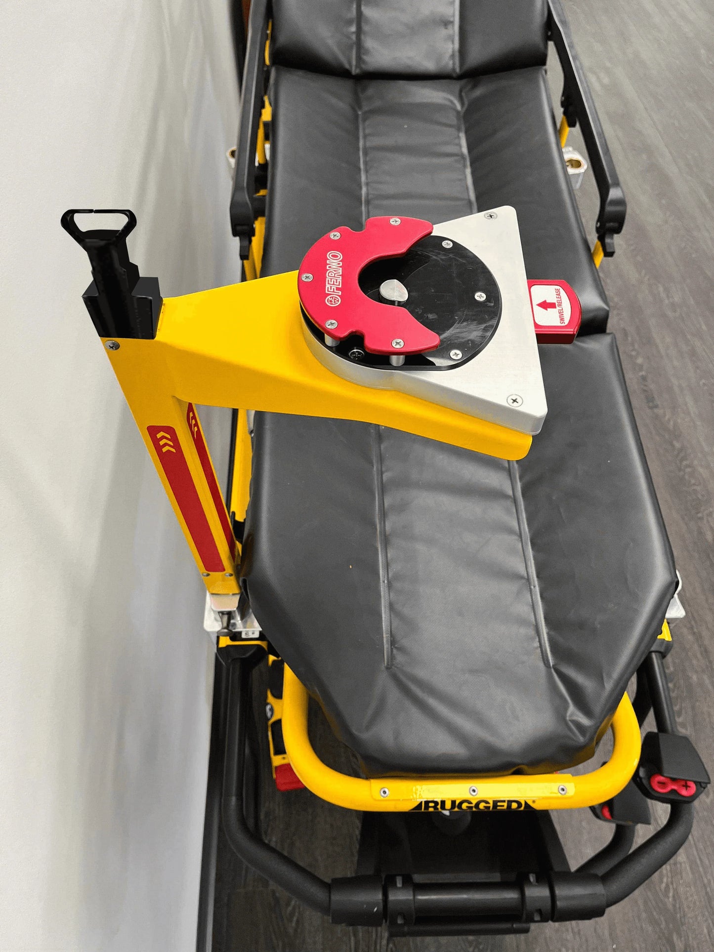 Ferno D360 stretcher with yellow IV pole adaptor and IV receptacle, by Rowland Emergency