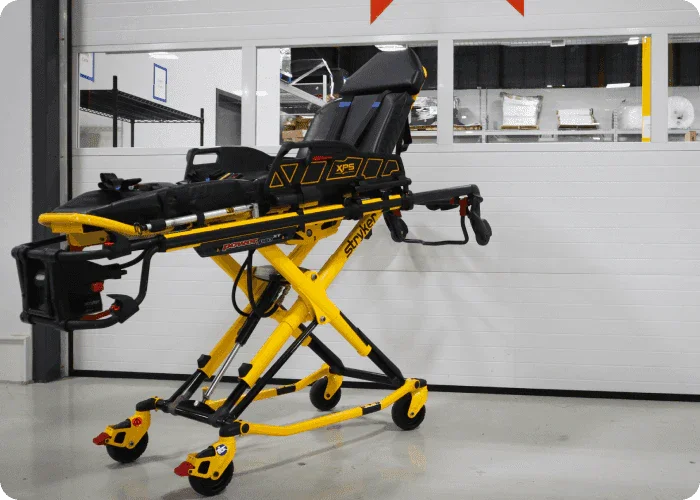 Refurbished Stryker® Power-PRO XT stretcher by Rowland Emergency, designed for reliable patient transport with advanced features and easy maneuverability.