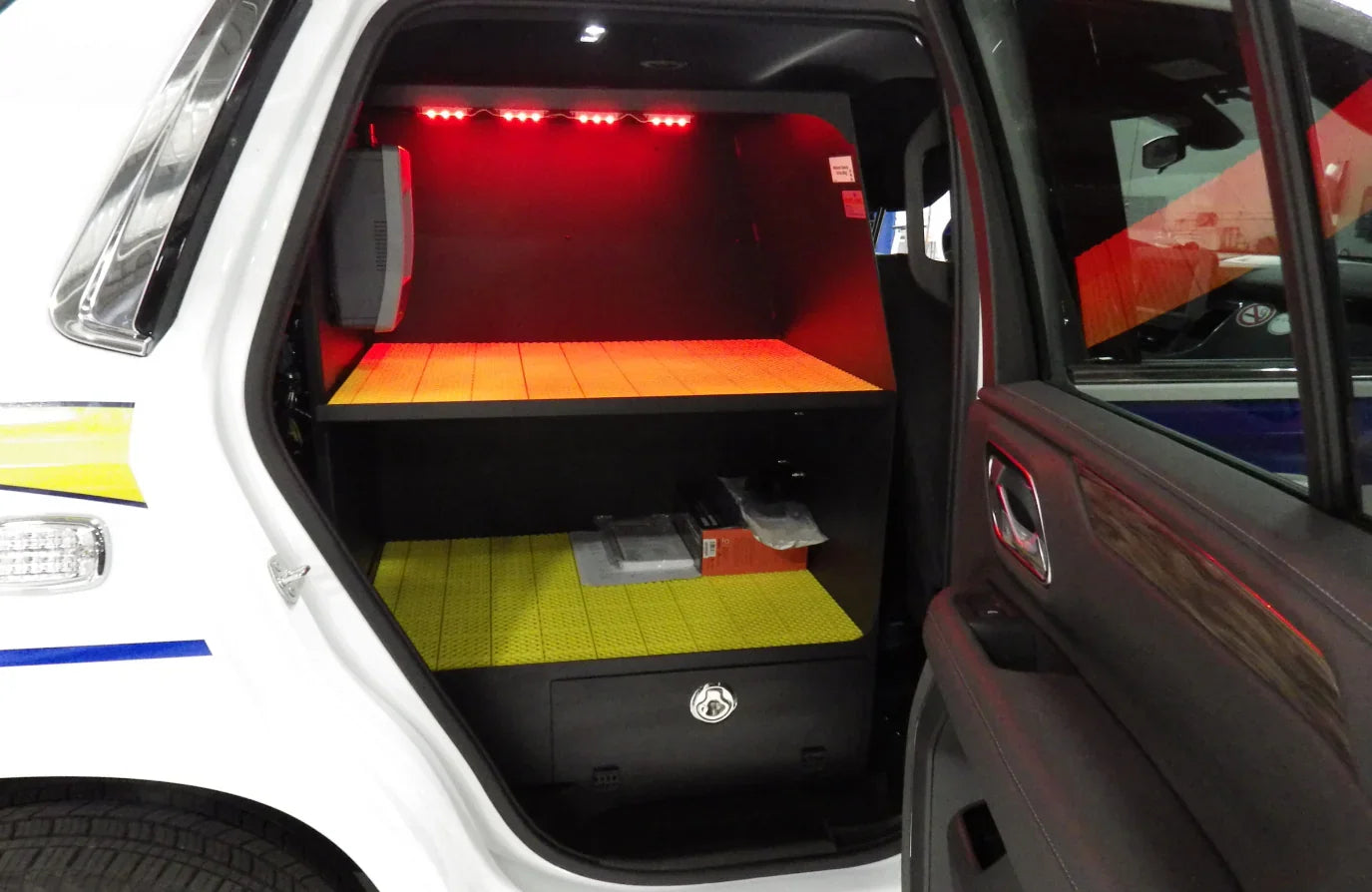 Right-side storage system with taller clearance for emergency response vehicles, designed for larger equipment and easy access.