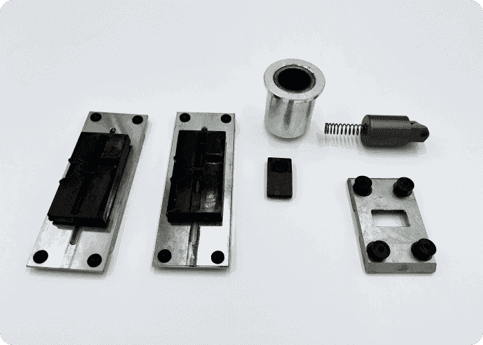 Stryker® Power-LOAD transfer lock plate and pin kit, designed for secure and efficient attachment during stretcher loading and unloading in emergency vehicles.