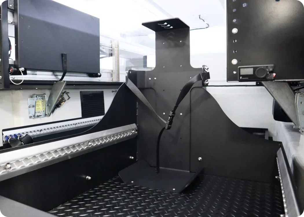Stryker LUCAS II mounting bracket securely installed on the rear cargo bedslide for efficient equipment access and storage.