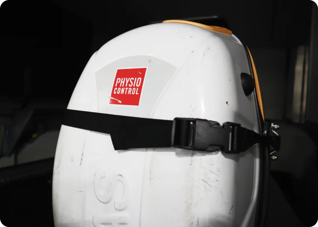 Close-up of Stryker LUCAS II mounting bracket with Stryker LUCAS II straps securely in use.