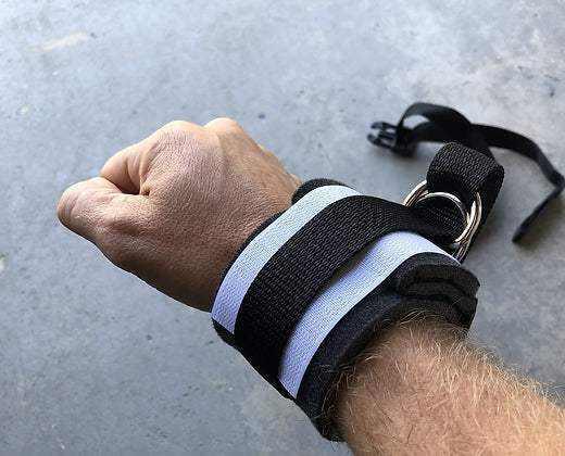 XDcuff® disposable restraint cuff with plastic buckle, designed for secure and efficient patient restraint during transport.