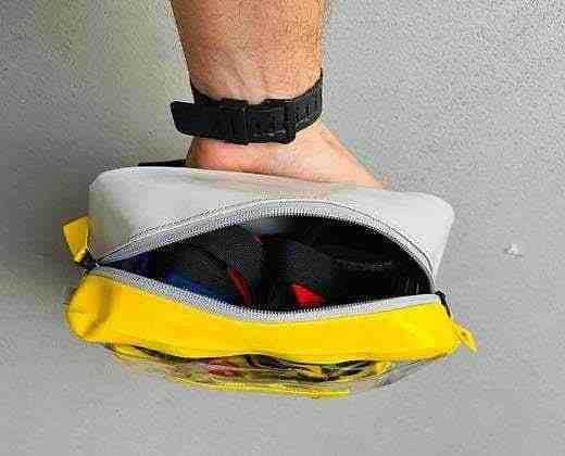 XDcuff® restraint storage straps + Pax Bag, designed for secure and organized storage of restraint equipment in emergency vehicles.