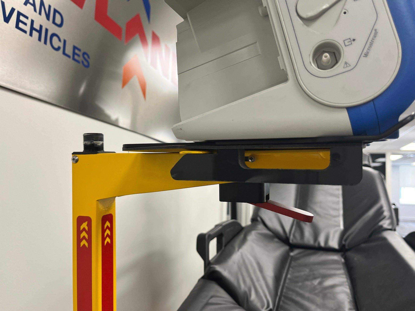 ZOLL® X Series® pole with IV by Rowland Emergency, providing secure mounting for the defibrillator during patient transport.