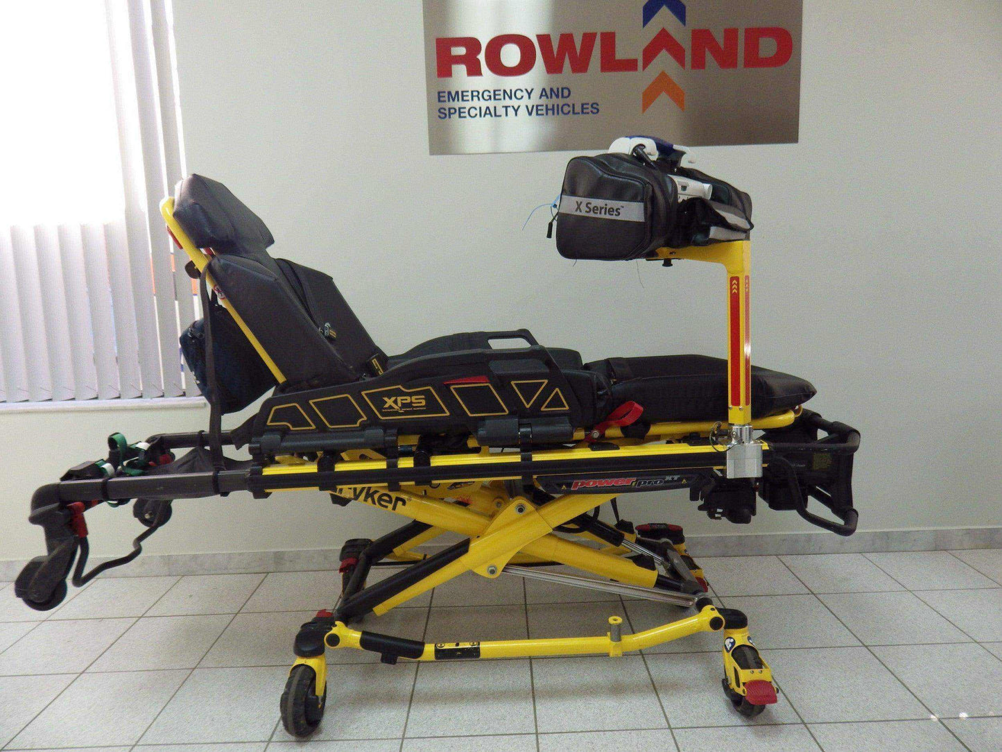 ZOLL® X Series® pole with no IV by Rowland Emergency, providing secure mounting for the defibrillator during patient transport.