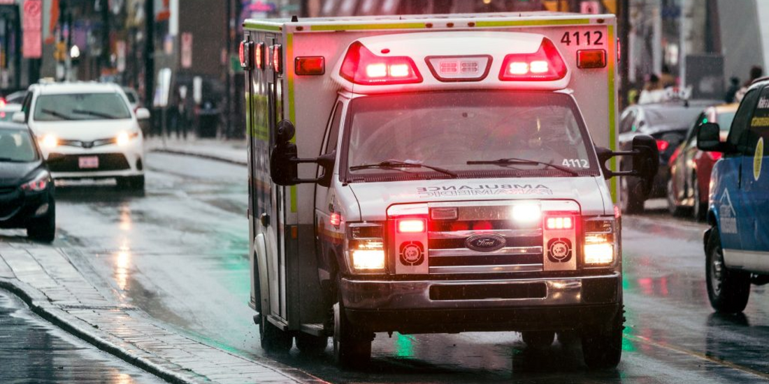 Ambulance with Red Flashing Lights