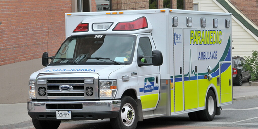 Custom paramedic ambulance parked in urban area, Muskoka EMS, Rowland Emergency vehicle