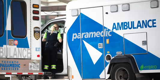 Toronto Paramedic Services ambulance and paramedic, highlighting EMS emergency response vehicle