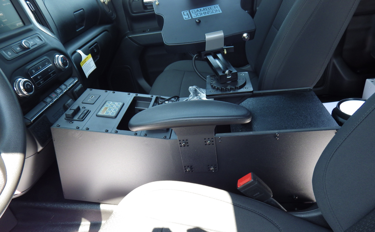 Image of a 12 Inch Center Console with a Computer Arm for an Emergency Vehicle