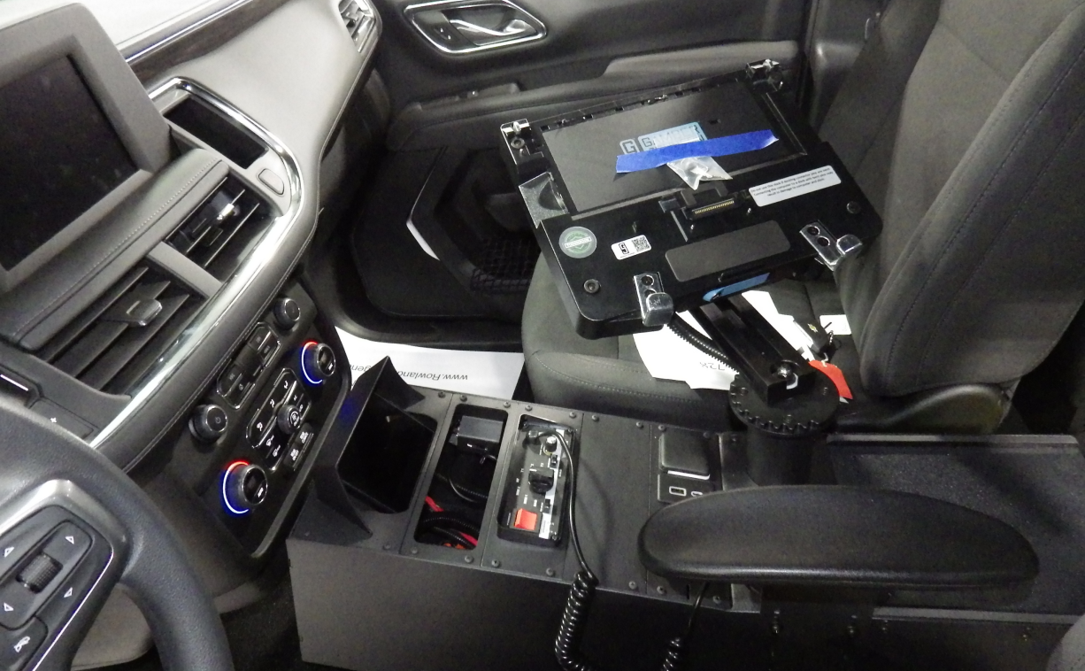 Image of a 14 Inch Center Console with a Computer Arm for an Emergency Vehicle