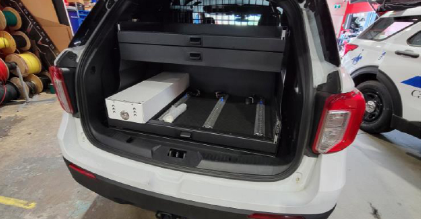 Rear storage system for a Ford Explorer, available with either a 3 tray setup or 1 tray and 1 shelf, designed for organized and accessible equipment storage.