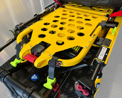 Yellow Stryker Power-PRO XT stretcher with multiple XDcuff REF115 straps