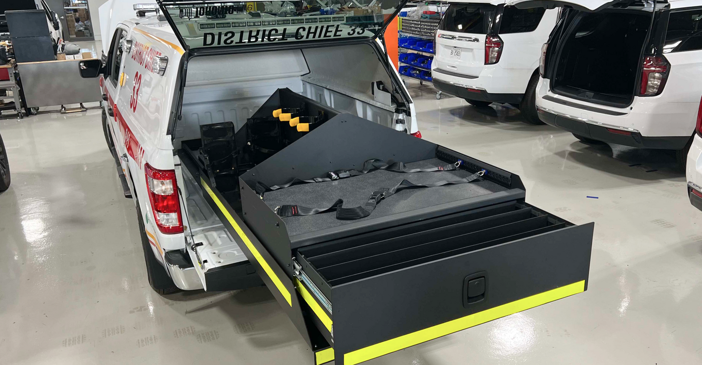 Rear Bed Slide Storage System for Emergency Response Trucks featuring a Drawer and Storage Unit