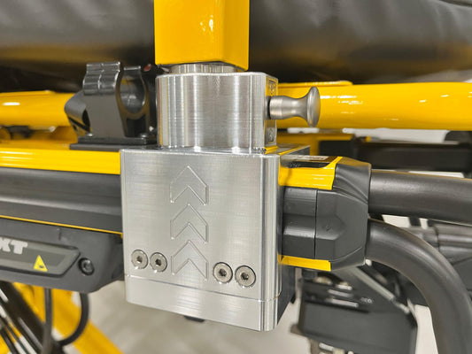Block for mounting a defibrillator pole that is used for patient transport.