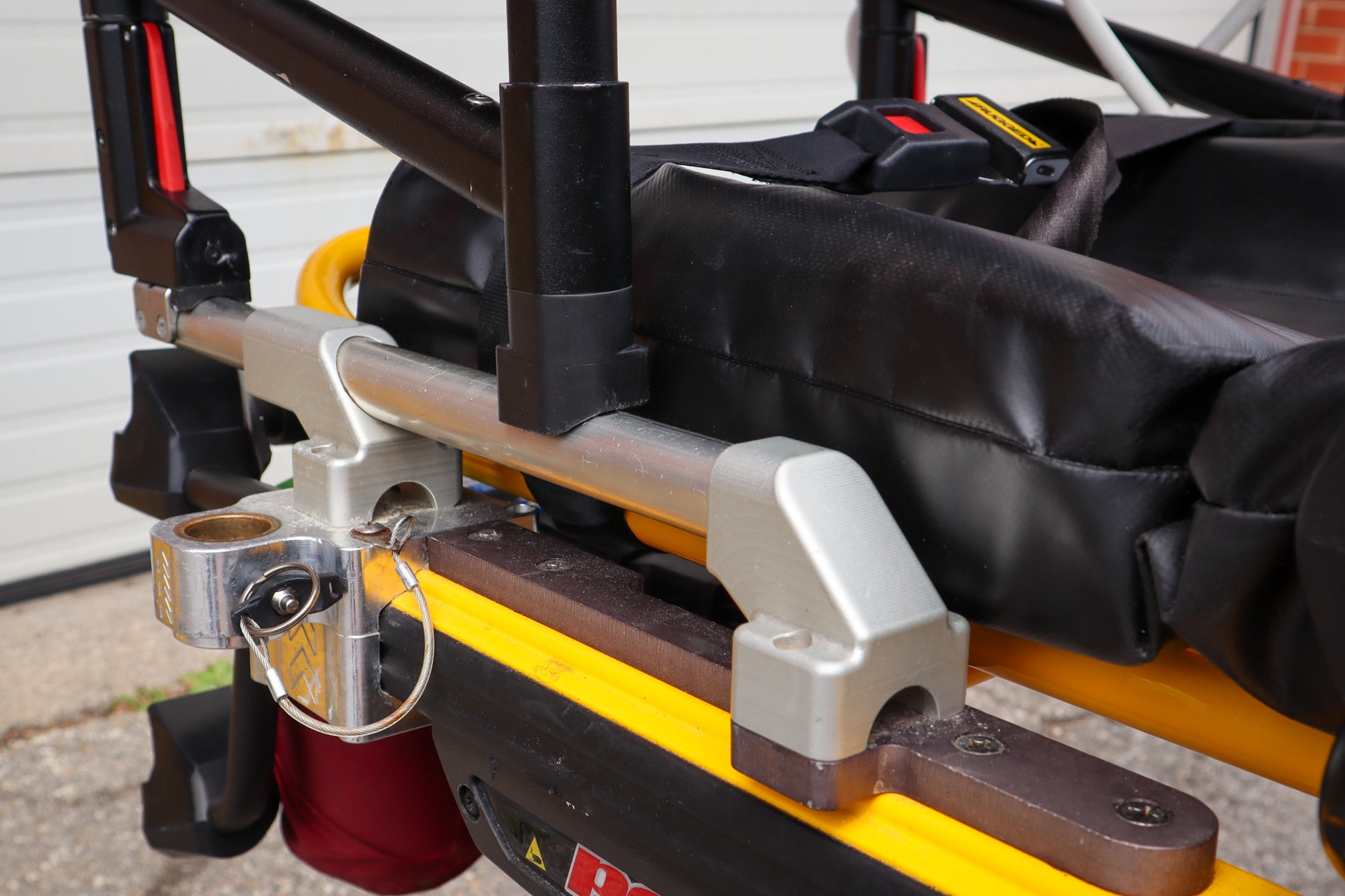 Close-up of a Ferno PacRac+ adaptor rail kit by Rowland Emergency.
