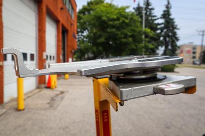 Close-up of a Rowland Emergency critical care pole with a Ferno D360 adaptor and CardioHelp mounting system attached to the pole system.