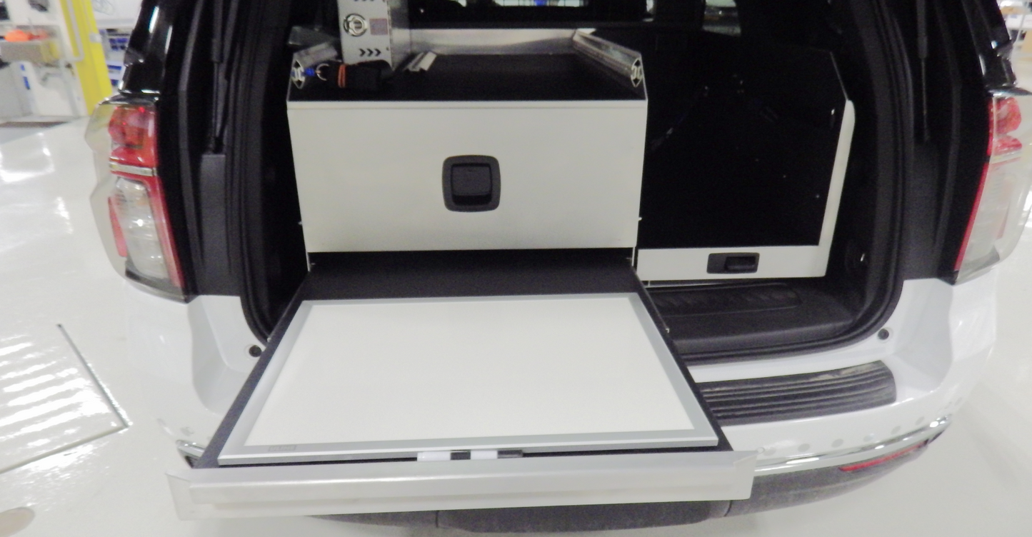 L drawer and desk rear storage system for emergency response vehicles, designed for organized equipment storage and easy access.