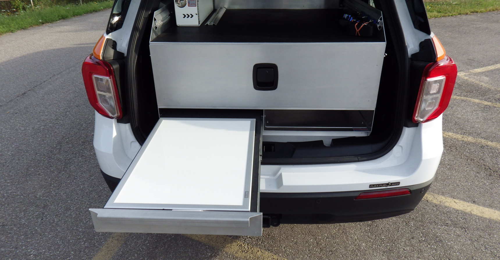 Rear Storage System for a Ford Explorer with a Large Drawer, Desk and Open Compartment